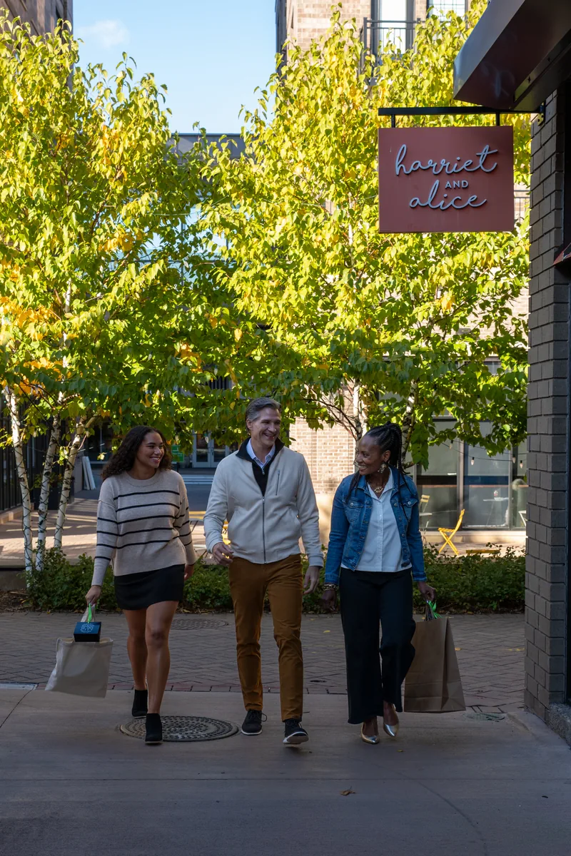 Street-level view of 50th & France corridor in Edina with pedestrians and storefronts